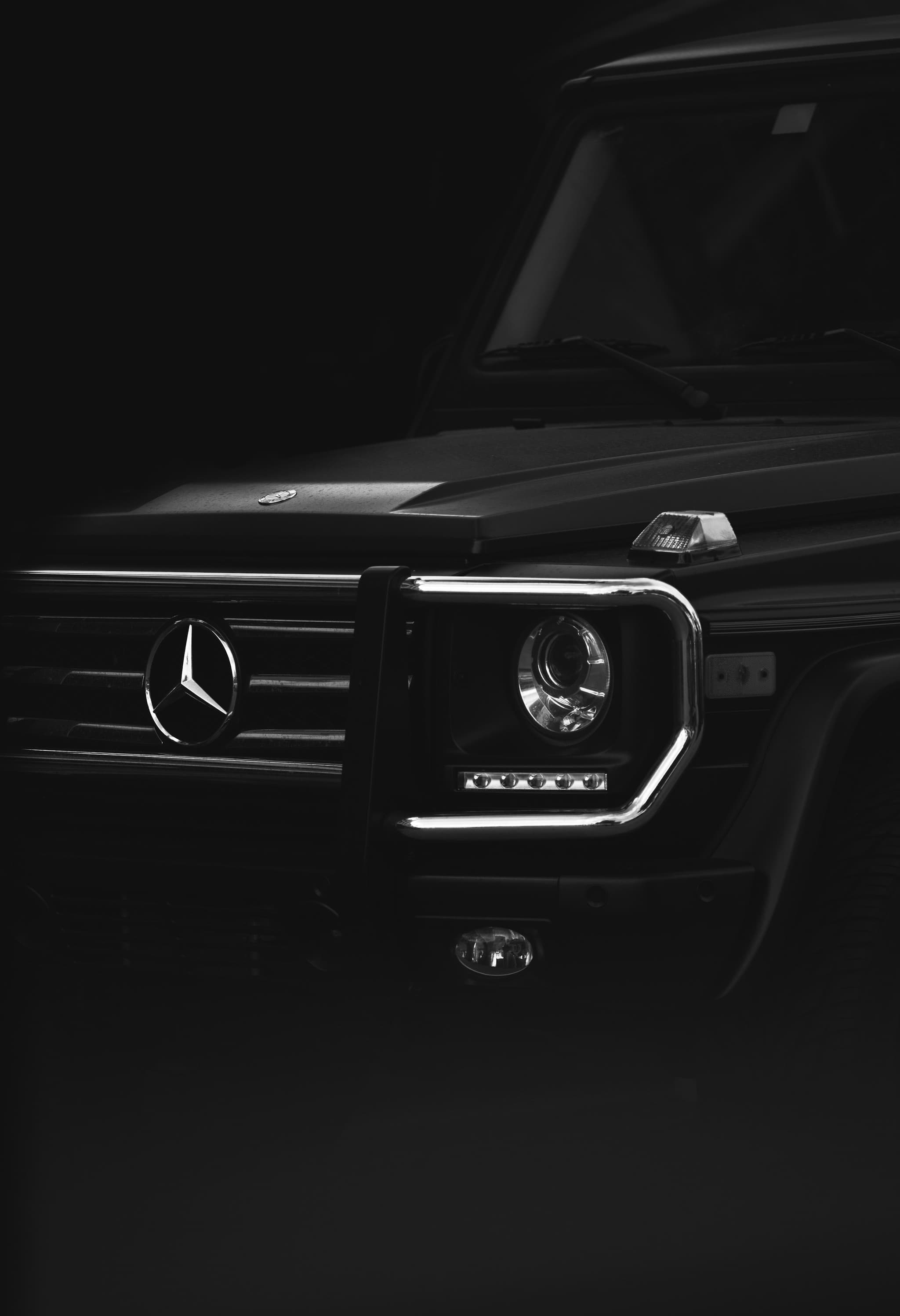 The front of a black vehicle finished to a deep gloss