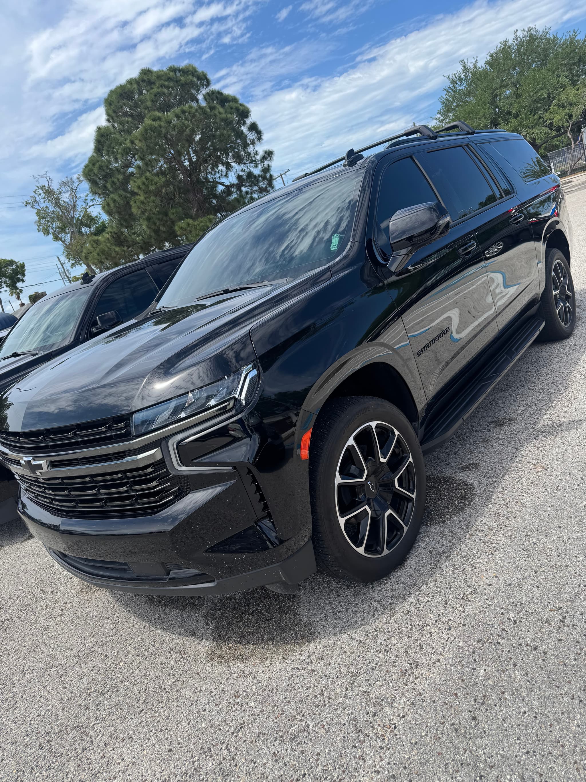 Black Chevy suburban after a full exterior detailing